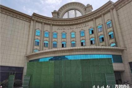 泰安华泰大酒店一房间失火,有拆建装修工人晚上居住